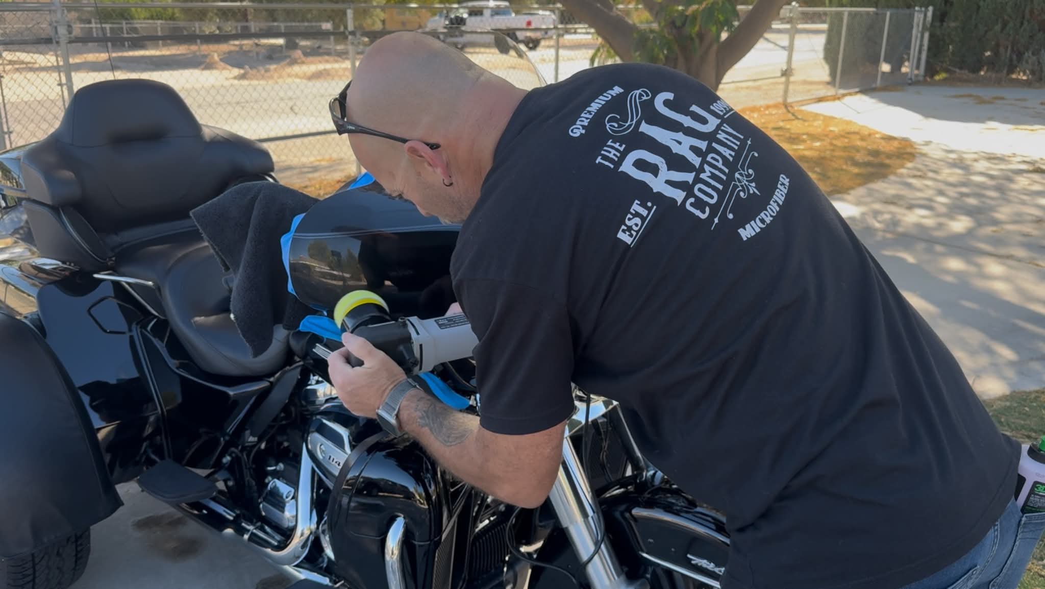 Maurice machine-polishing paintwork to remove swirls and restore gloss during a paint correction