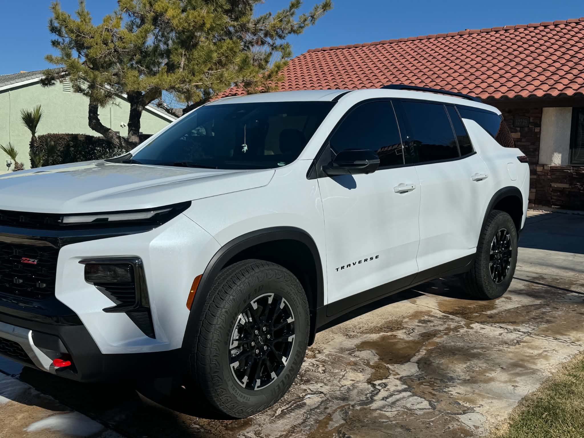 White Chevrolet Traverse Z71 freshly washed and sealed